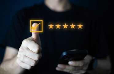 Customer satisfaction assessment. service business, evaluation, satisfaction, customer acceptance. Businessman using hand touching point on star rating 5 stars