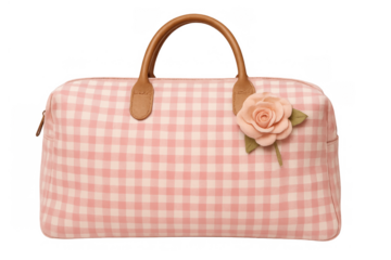 Pink gingham pattern handbag with brown leather handles and decorative rose flower, feminine fashion accessory