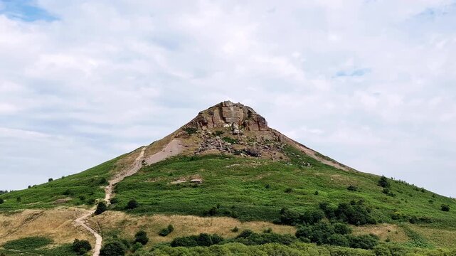 Aerial video of Roseberry Topping Yorkshire UK.Roseberry Topping is a distinctive hill in North Yorkshire, England. It is situated near Great Ayton and Newton under Roseberry. 