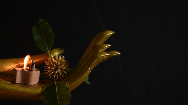 Aromatherapy with Kratom or Mitragyna speciosa Korth branch flower on black ceramic background.