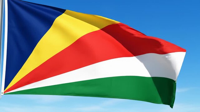 Waving Seychelles Flag Against Blue Sky