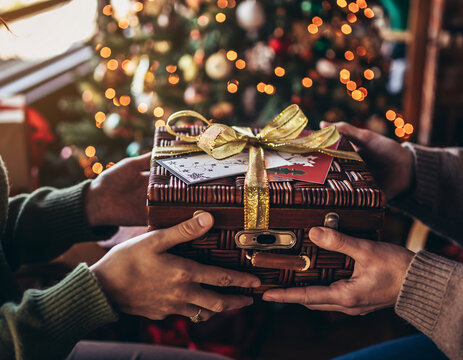 Christmas hamper gift exchange with golden ribbon detail