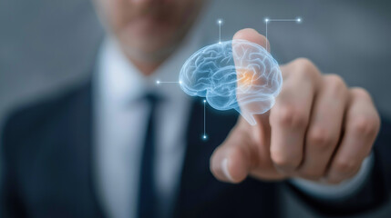 Professional interacts with glowing holographic brain representation showcasing cognitive technology innovation.
