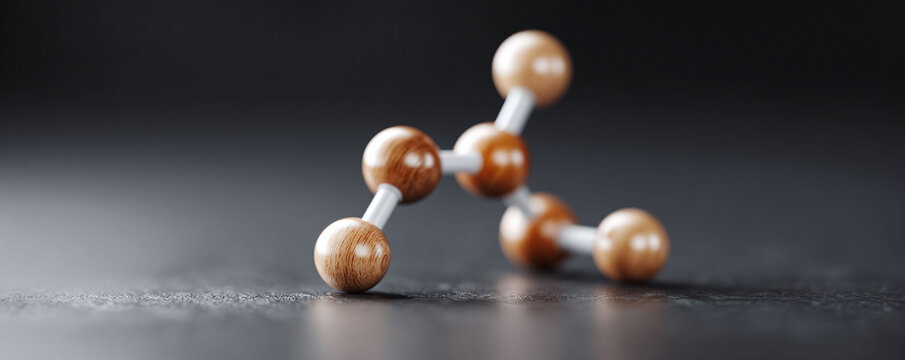 Molecular structure closeup. Abstract scientific model with wooden spheres  rods. Visualizes concepts like connectivity, research, science, education  innovation.