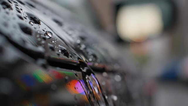 Water Droplets on Car Windshield After Rain in the City