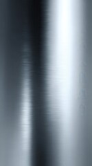 Brushed metal surface showing linear scratches and strong reflections, creating a clean, modern, and industrial background texture with a smooth, shiny appearance