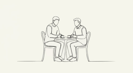 Two men sitting at a table having a conversation.