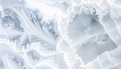 Obraz premium Close-up of frosty ice patterns on a window, creating a beautiful winter background.