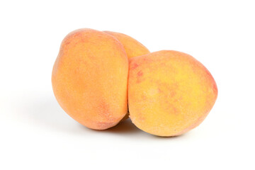 Ugly peach. Two peaches fused into one on a white background.