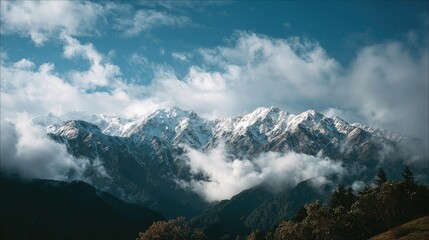 Serene Wide-Angle View of Towering Mountains Glowing in Sunlight and Crisp Fresh Air
