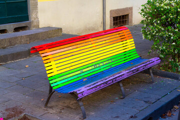 Rainbow Bench on Sidewalk in Lucca, Italy