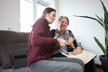 Family bonding time with pet chinchilla on cozy sofa