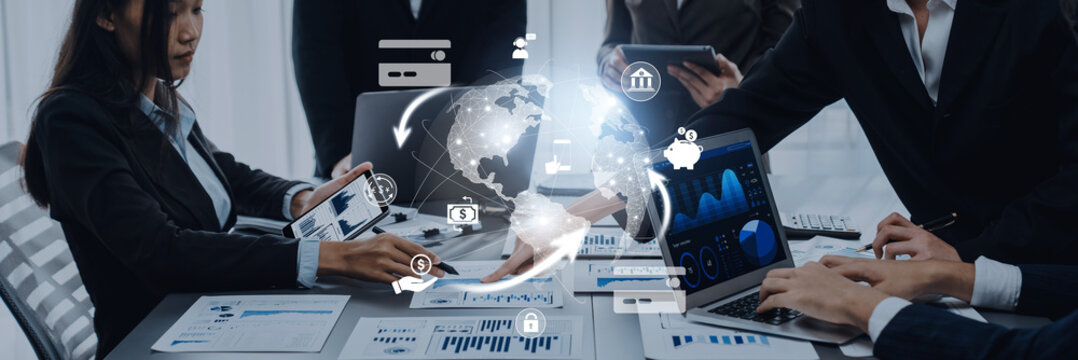 A dynamic business meeting featuring professionals utilizing digital tools to discuss finance trends, strategy, and collaboration for effective decision-making and growth in a corporate setting. Trope