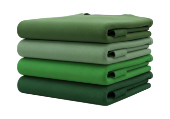 Stack of four folded garments displays a gradient of green hues against a dark background