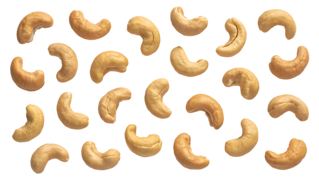 Assortment Of Cashew Nuts Scattered On White Background Keywords: cashews, cashew nuts, snack isolated on a transparent background