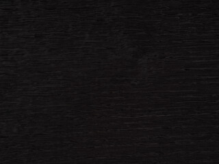 Black stained oak veneer surface with a subtle yet captivating wood grain texture