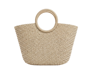 Natural fiber woven tote accessory displays circular handles against a dark backdrop