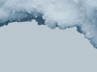 Macro close-up of icy blue frost & icicles — top-border winter banner background with copy space