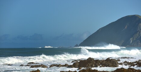 The Inter Islander ferry rounding Red Rocks