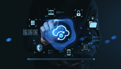 Cloud data synchronization concept with futuristic interface icons on a tablet screen and person interacting with cloud computing technology..
