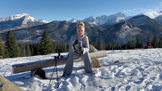 Beautiful senior woman in the mountains