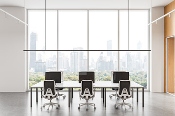 Modern office interior with workstations and panoramic city view through large windows in open space layout. 3D Rendering