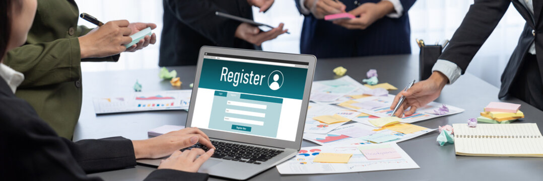 Analyst team use sticky note for creative and analytic brainstorm for business idea with BI data dashboard on laptop screen. Analysis financial data visualization tech for marketing strategy. Prodigy - Powered by Adobe