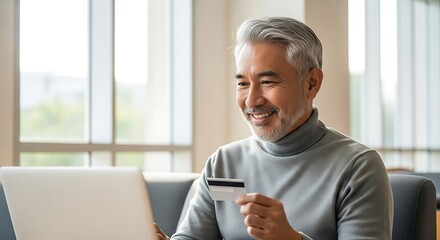 Smiling Senior Man Shopping Online with Credit Card