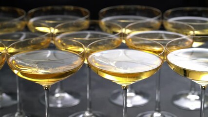 champagne wine in a coupe glasses ready to drink, close up. Close up background with glasses of sparkling champagne . - Powered by Adobe