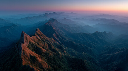 mountain range silhouette against a vibrant sunset, teal and gray hues, soft depth of field, dramatic lighting,