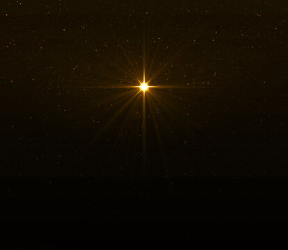 Glowing Golden Star in the Night Sky. Symbol of Christmas and New Year.
