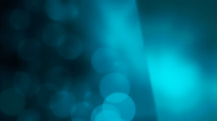 Abstract teal blue light streaks and bokeh background