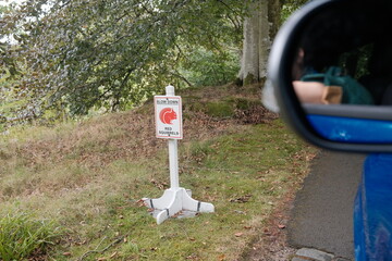 slow down sign for red squirrels in Scotland