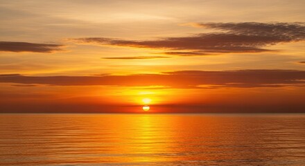 Obraz premium Vibrant Golden Sunset Over Calm Ocean Horizon