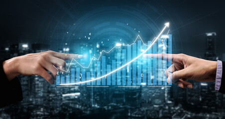 Two hands reach toward a glowing digital graph, symbolizing collaboration and growth in finance. The backdrop features a cityscape, enhancing the theme of progress. Impute