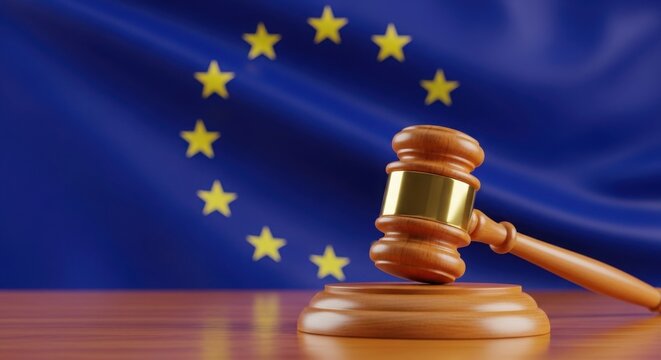 Wooden gavel on desk with european union flag in background symbolizing eu law and justice.