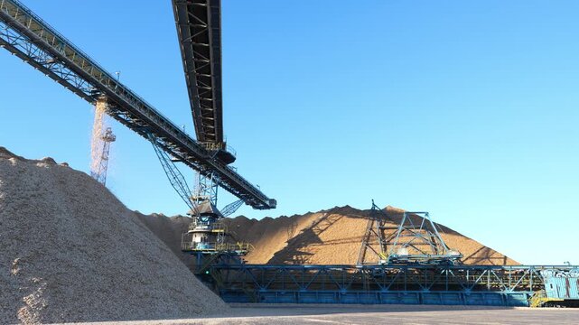 Drying and storage of wood chips in piles. General view of the paper mill. Paper production