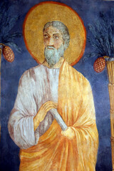 San Clemente Basilica.  Apostle  with halo holding scroll, wall fresco. Medieval Christian art.