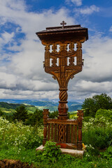 Traditionally carved wooden cross. Maramures, Romania. 