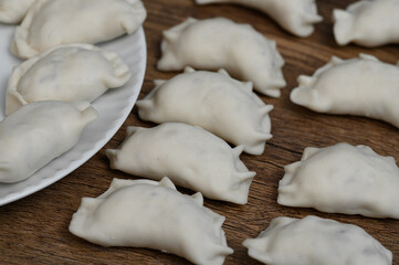 Make dumplings stuffed with cheese and potatoes