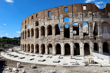 Exterior view shows massive elliptical structure of the Colosseum, largest ancient amphitheatre worldwide.