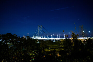 Fototapeta premium Hercilio Luz Bridge at night in Florianopolis, Santa Catarina, Brazil.