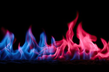 Vibrant colored flames against black background