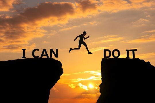 A silhouette man jumping over cliffs for "I can do it" good mindset by never give up concept