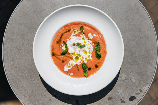 Tomato cream soup garnished with basil