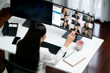 Business people on video conference for brisk virtual group meeting of corprate business office workers