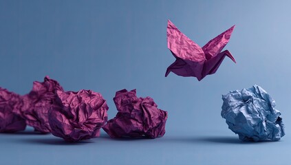 Origami bird soaring above crumpled paper (2)