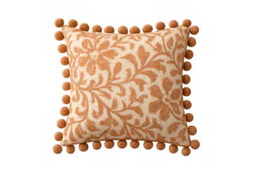 Decorative throw pillow with floral pattern and pom-pom trim in warm orange and cream colors, transparent background