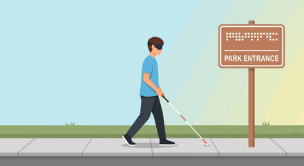Blind man with cane walking on sidewalk near park entrance sign with braille writing.