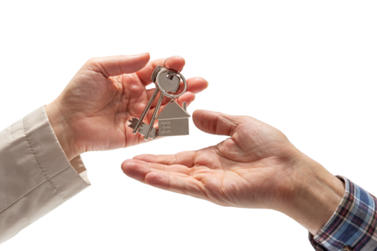 Woman's hand giving keys to hand of man in a checkered shirt on an isolated background. Concept of sale of real estate, rent of housing - Powered by Adobe